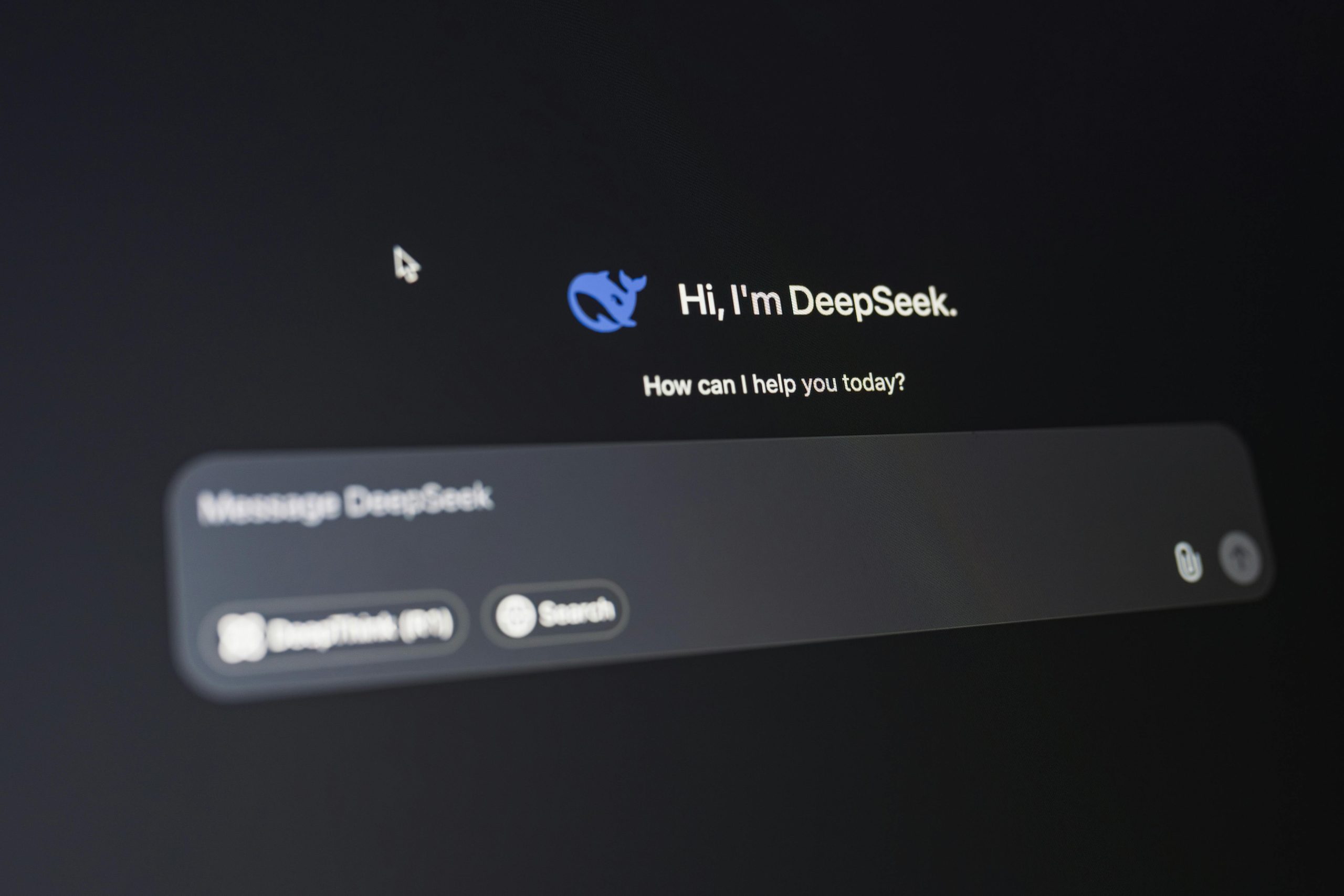 A detailed view of the DeepSeek AI interface, displaying a welcoming message on a dark background.